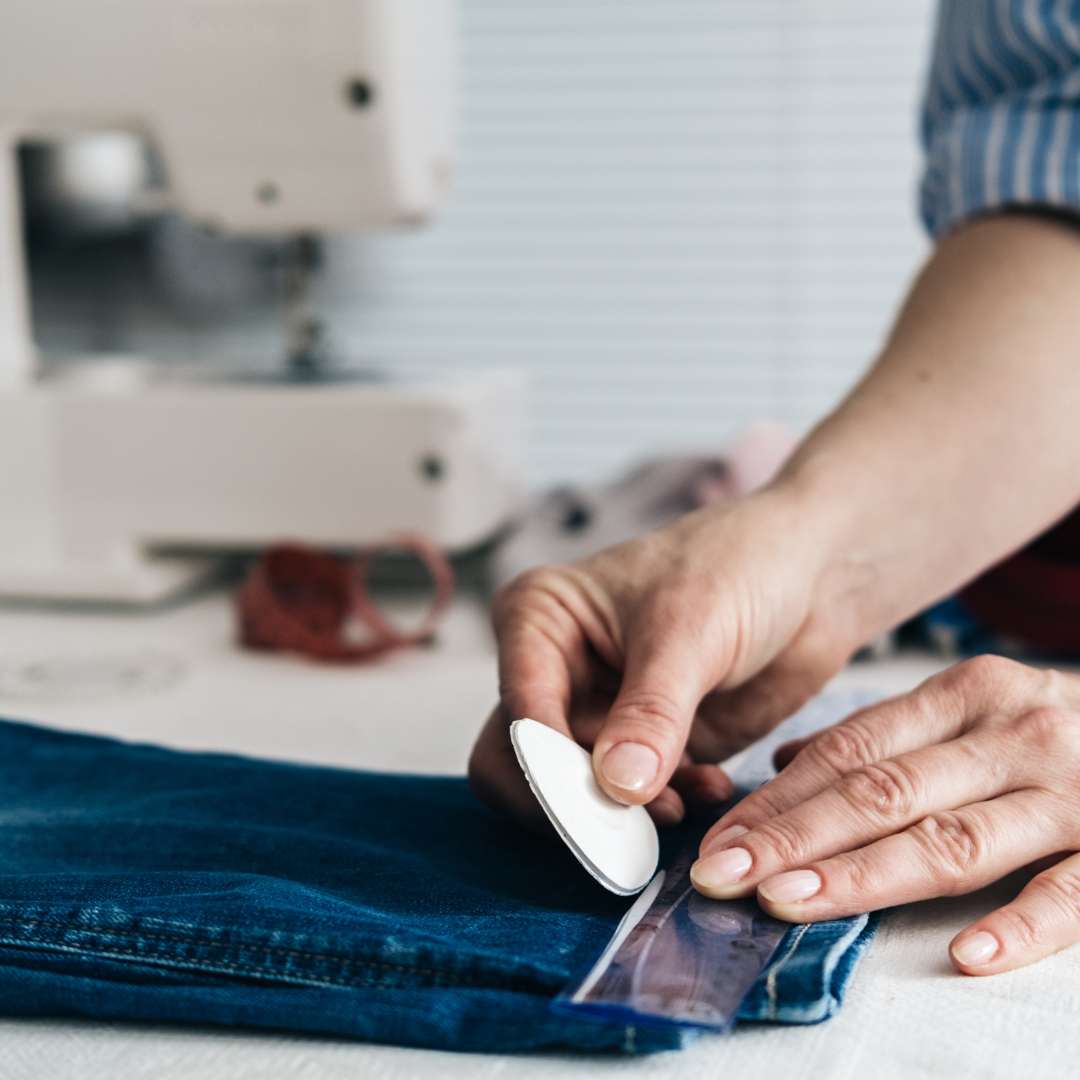 cutting hem of a jeans